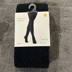 Never worn size S/M (4-6) sweater tights